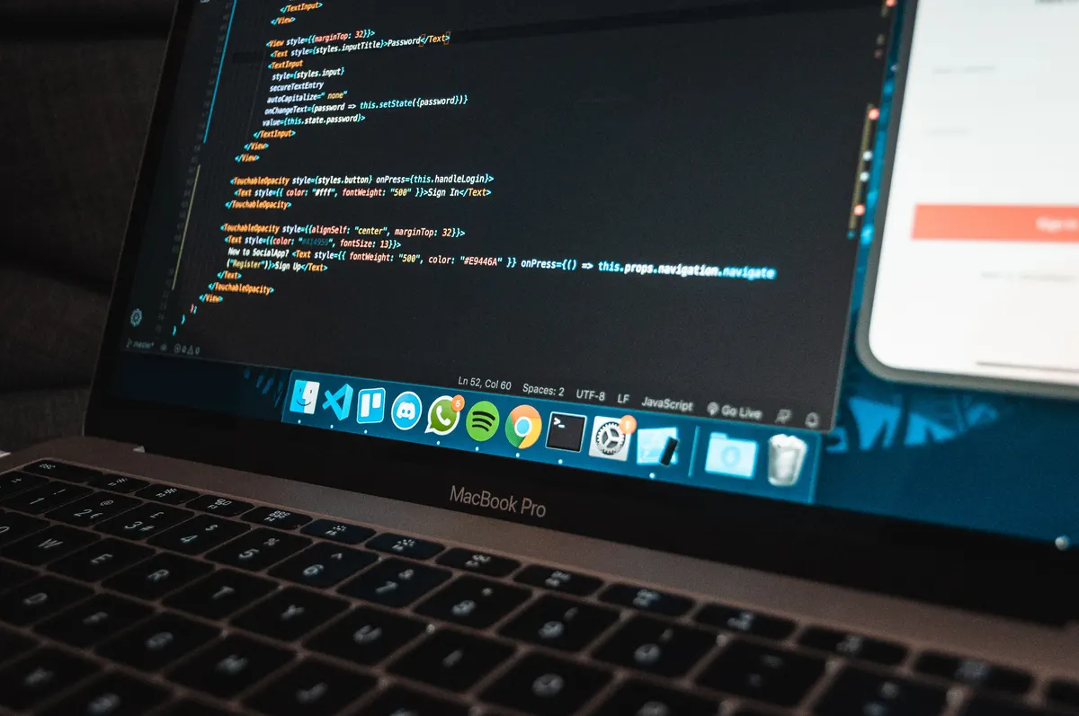 Technical SEO foundation of a website shown through code on a laptop screen